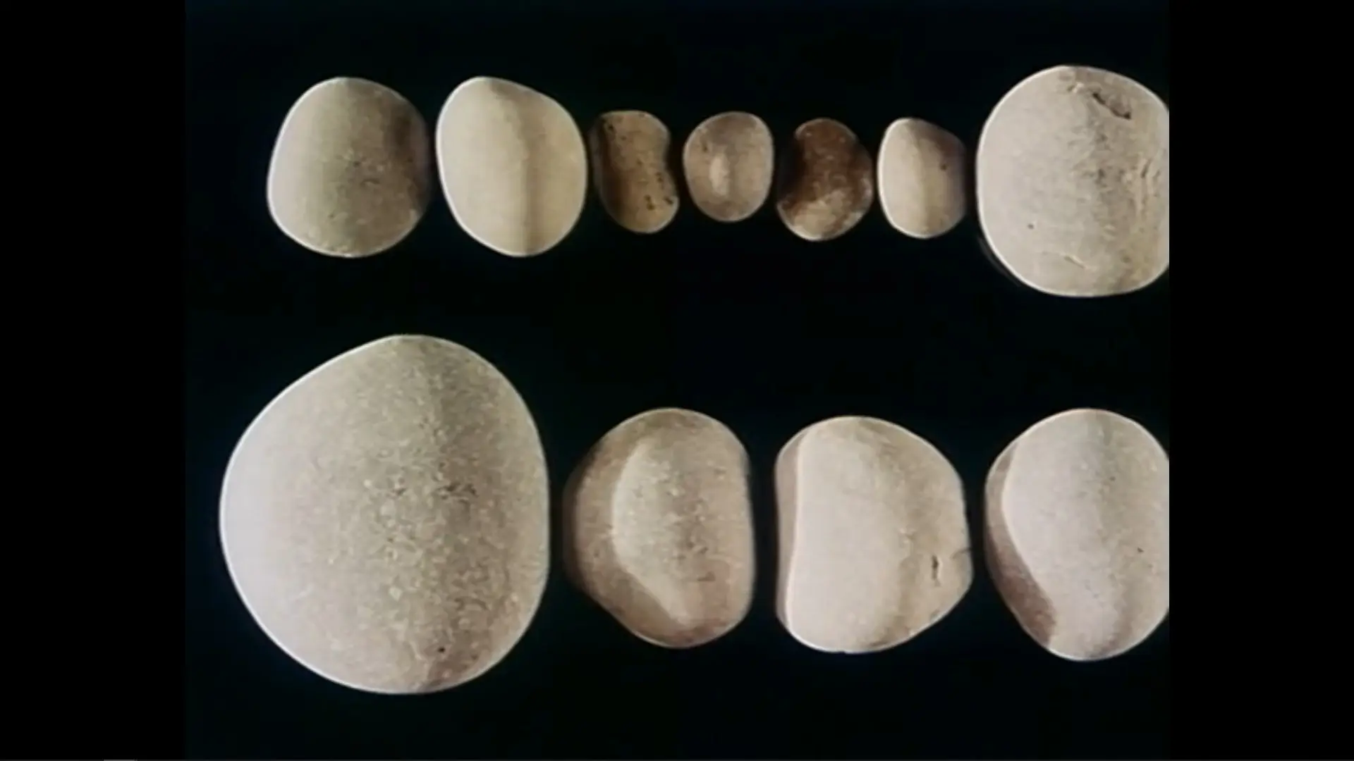 A Game with Stones backdrop