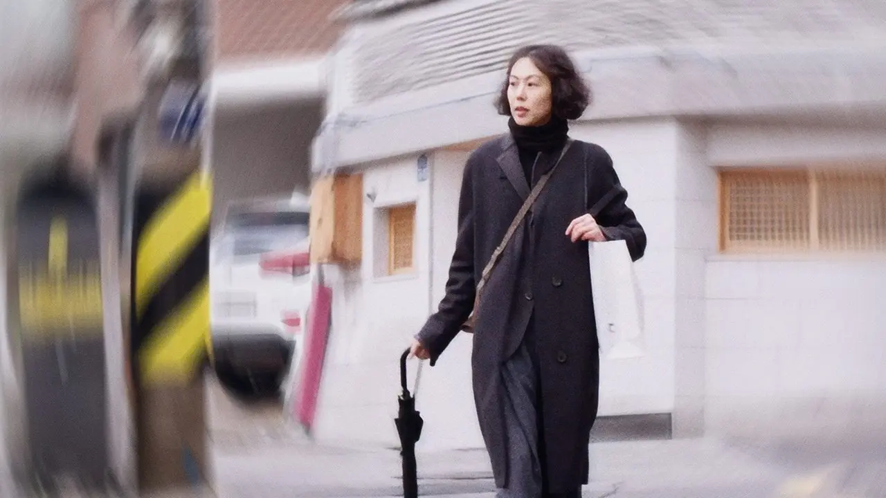 The Woman Who Ran backdrop