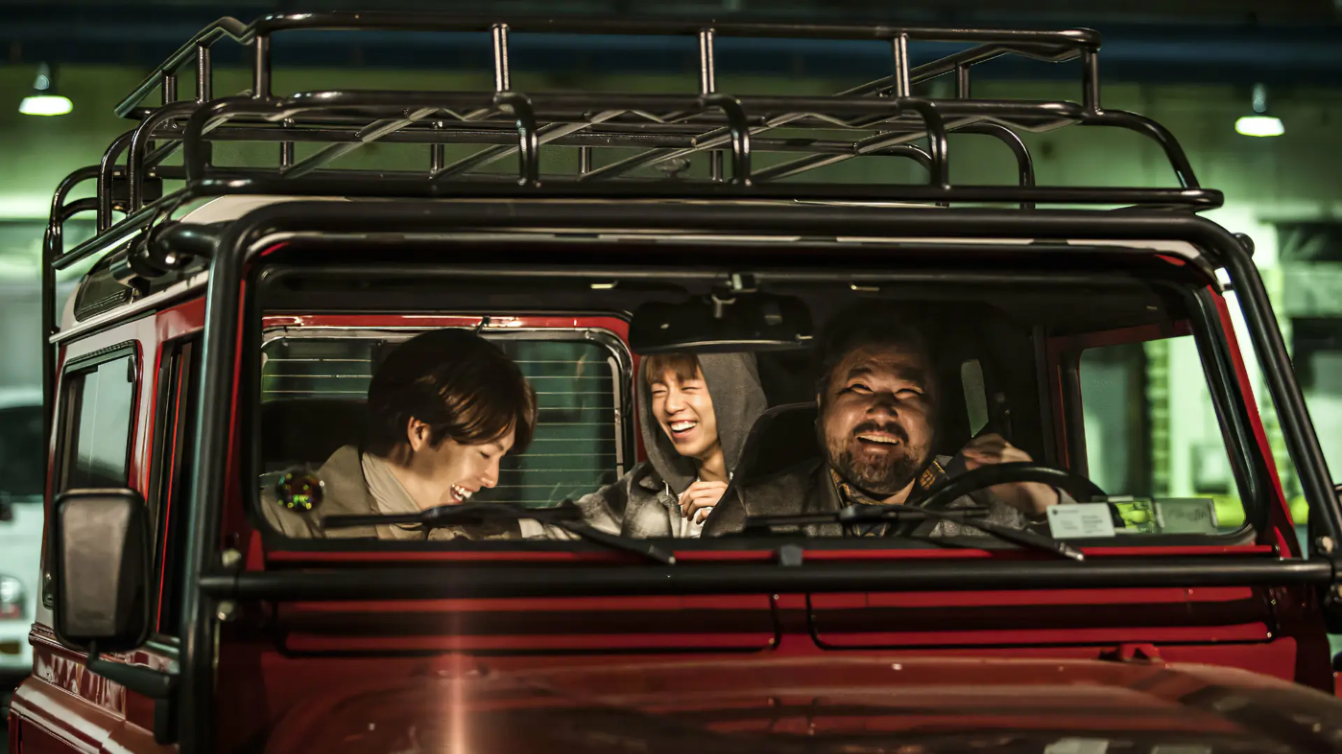 The Con Artists backdrop